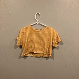 Yellow cropped shirt